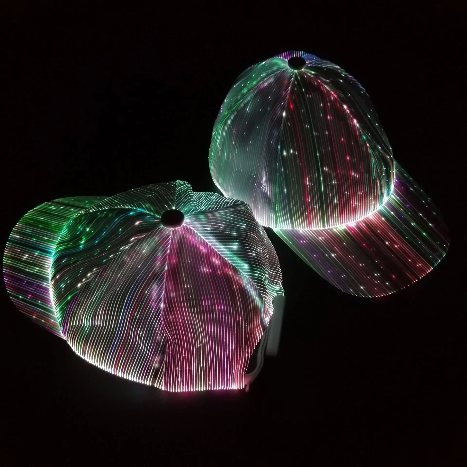 White unisex luminous baseball cap with fiber optic fabric LED glow against dark background