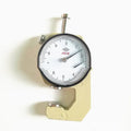 Handheld thickness gauge for measuring steel tubes and film cloth materials