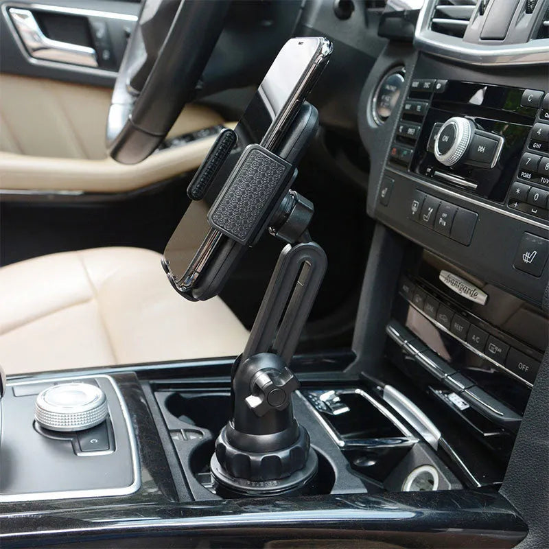 Black universal car phone holder with 360-degree rotating head and adjustable height on a car air vent.