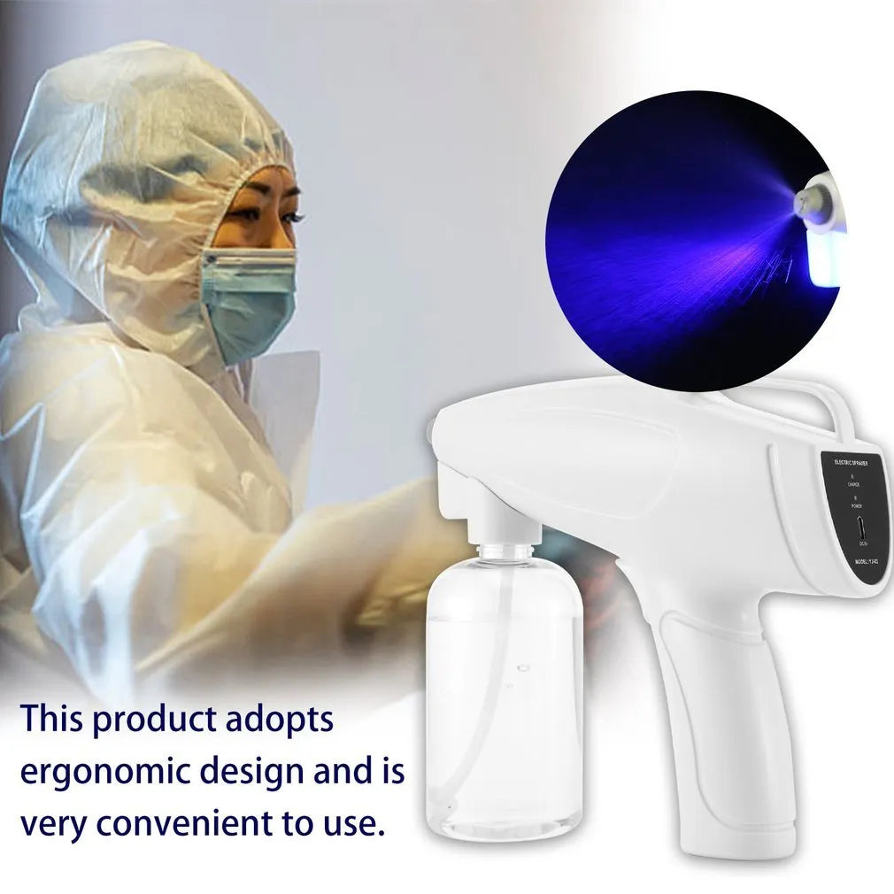 White handheld cordless electric spray disinfection gun with USB charging cable