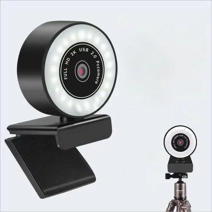 Black high-definition USB webcam with built-in fill light for video conferencing on a PC.