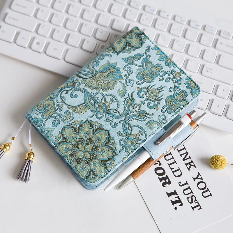 Blue floral fabric cover notebook in A5 and A6 sizes, showing the 'flying blue flowers' design.