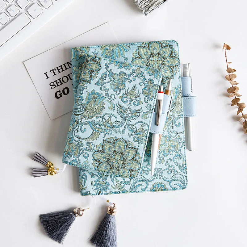 Blue floral fabric cover notebook in A5 and A6 sizes, showing the 'flying blue flowers' design.