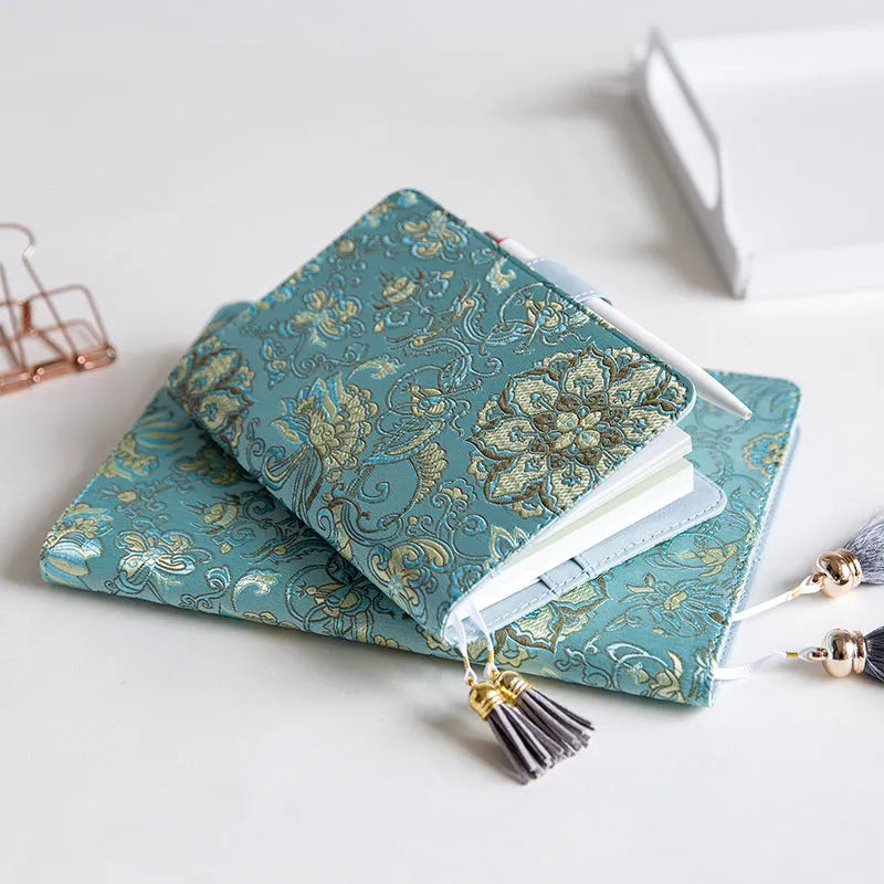 Blue floral fabric cover notebook in A5 and A6 sizes, showing the 'flying blue flowers' design.