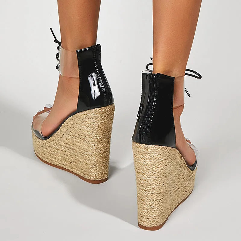 Black women's wedge sandals with a high hemp rope tie and over 8cm heel.