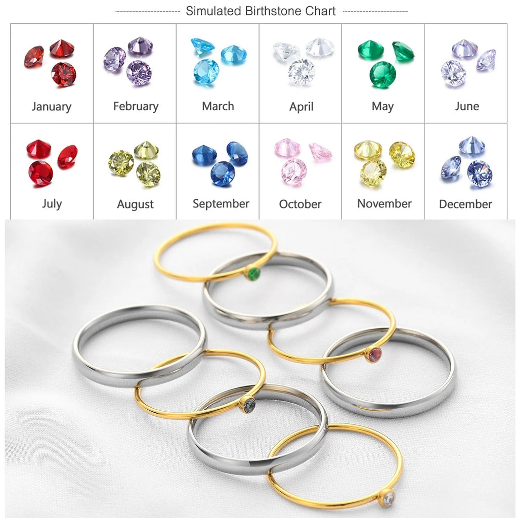 December colour birthstone engraved titanium steel ring with geometry shape on a grey background.