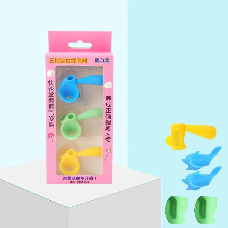 Children's pen holder writing orthosis with corrector tool in assorted colour sets.