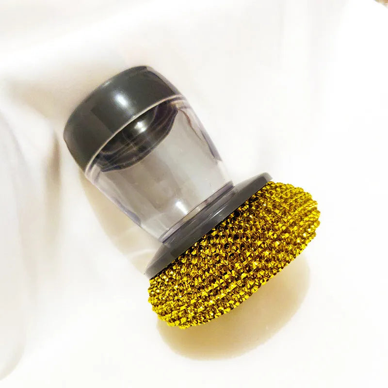 Kitchen palm brush with integrated push-type soap dispenser and bristles for scrubbing.