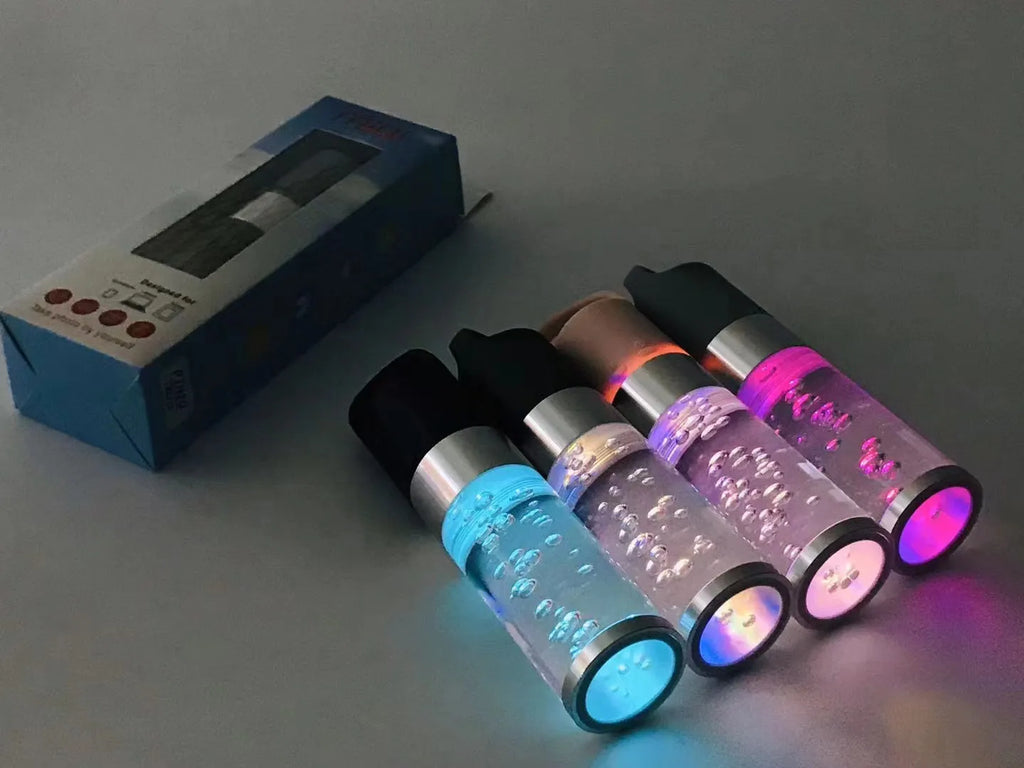 Pink cartoon-themed portable Bluetooth speaker with colourful crystal lights.