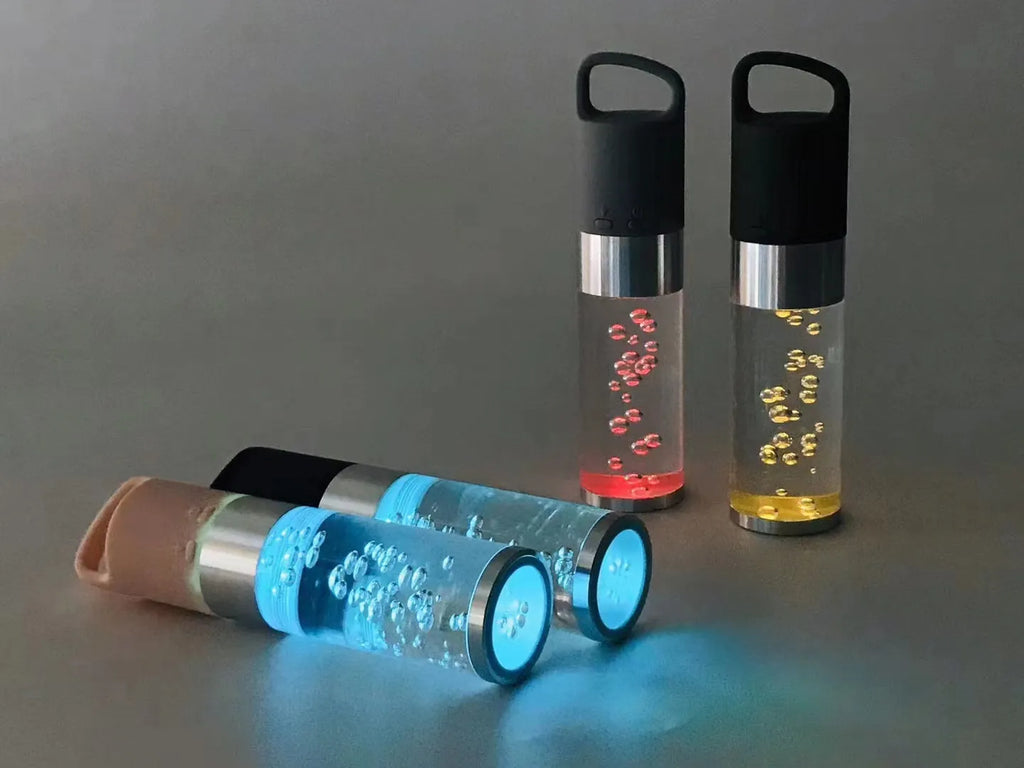 Pink cartoon-themed portable Bluetooth speaker with colourful crystal lights.