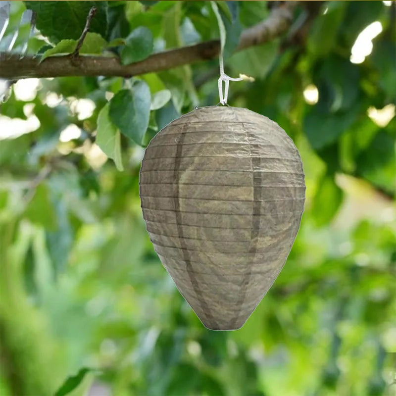 Paper honeycomb lantern with wire frame in a 22 by 28 cm size for party decoration.