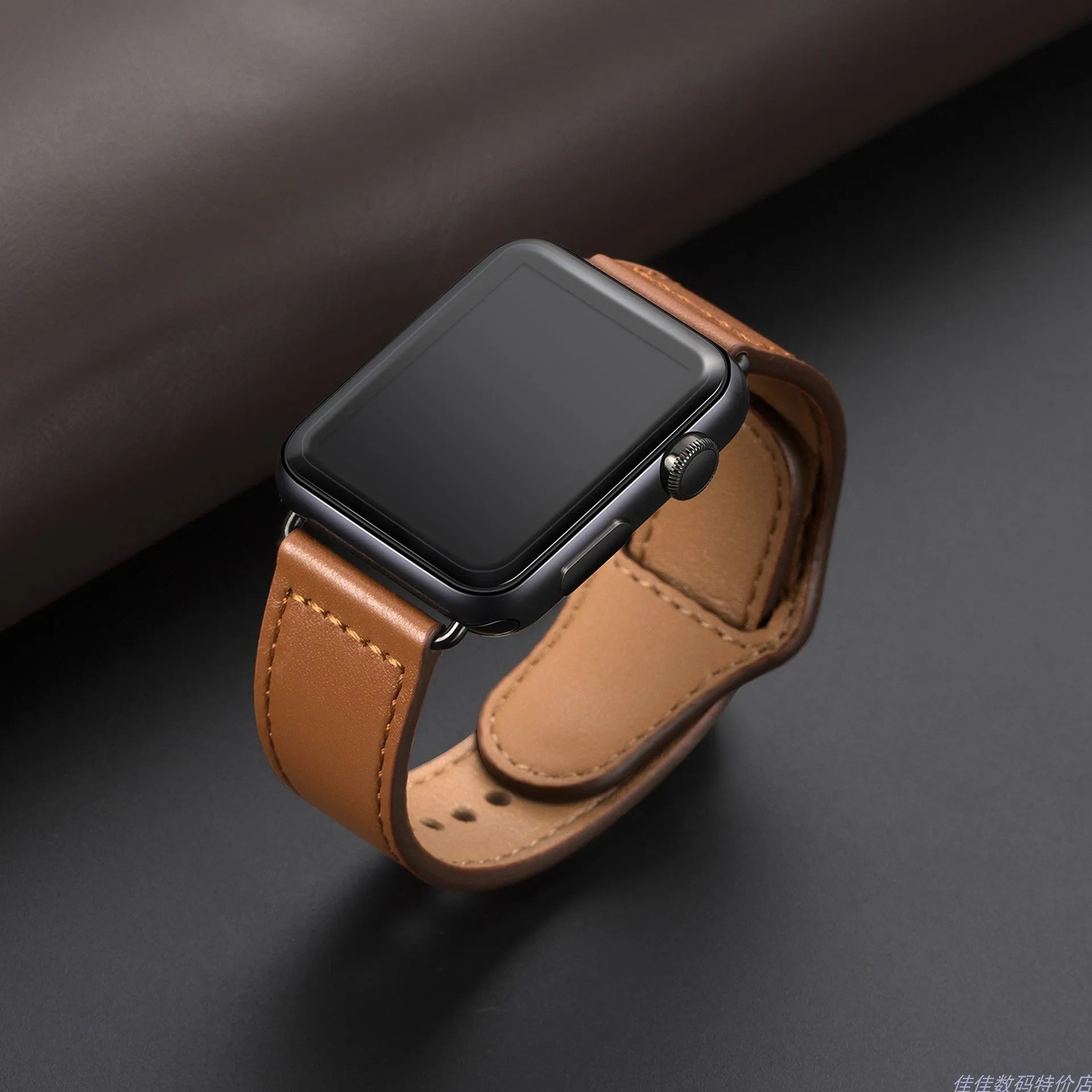 Geometric pattern artificial leather watch strap in black, shown with metal buckle clasp.