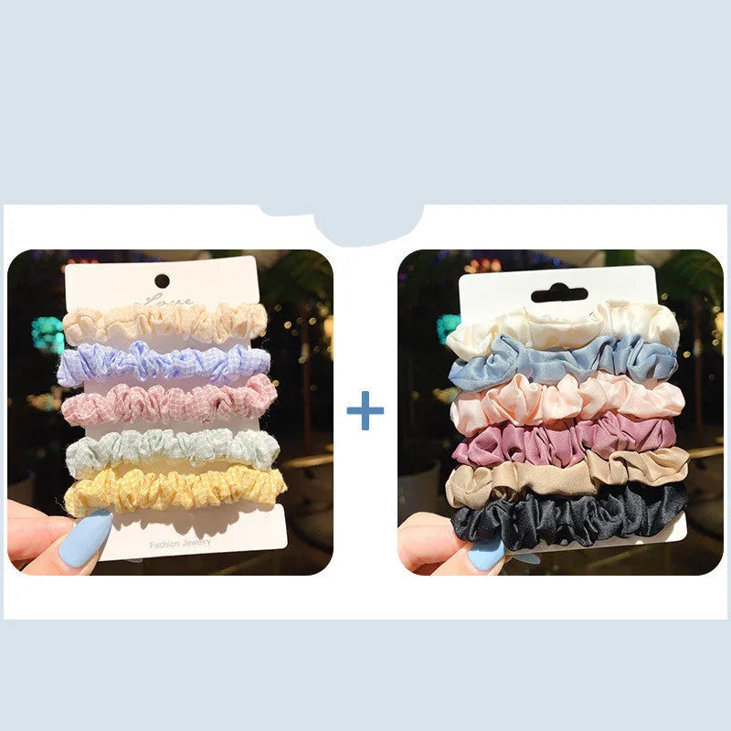 Assorted children's hair rings and head ropes in autumn colours and macaron pastels.