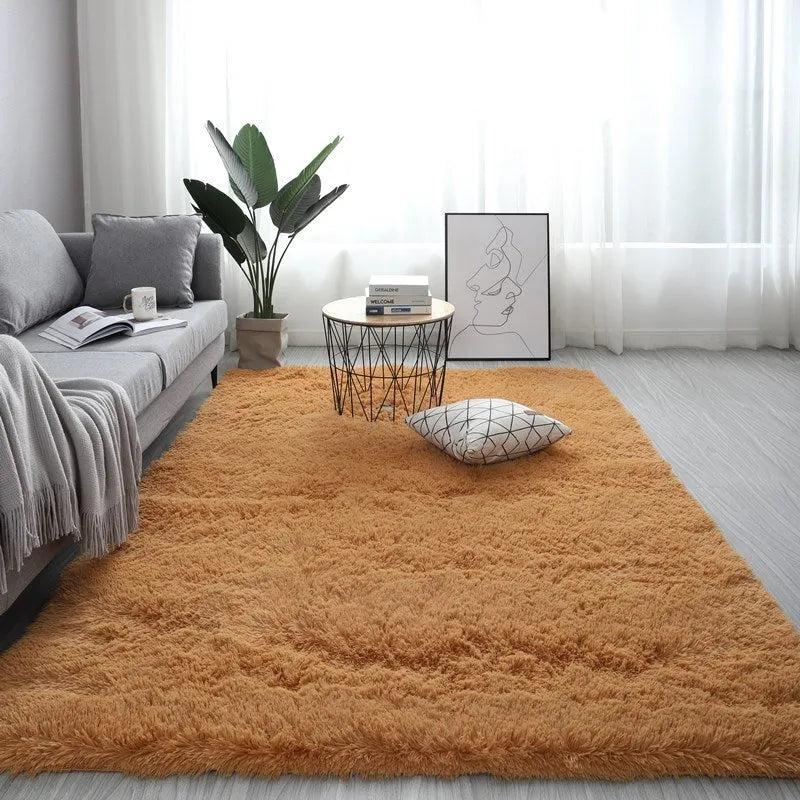 Nordic style plush rectangle carpet in a light colour on a wooden floor