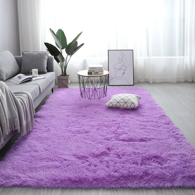 Nordic style plush rectangle carpet in a light colour on a wooden floor