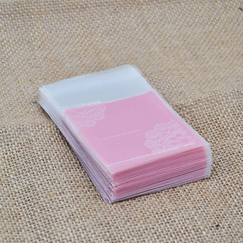 Pink self-adhesive plastic packaging bag for handmade soap and snacks with gusset.