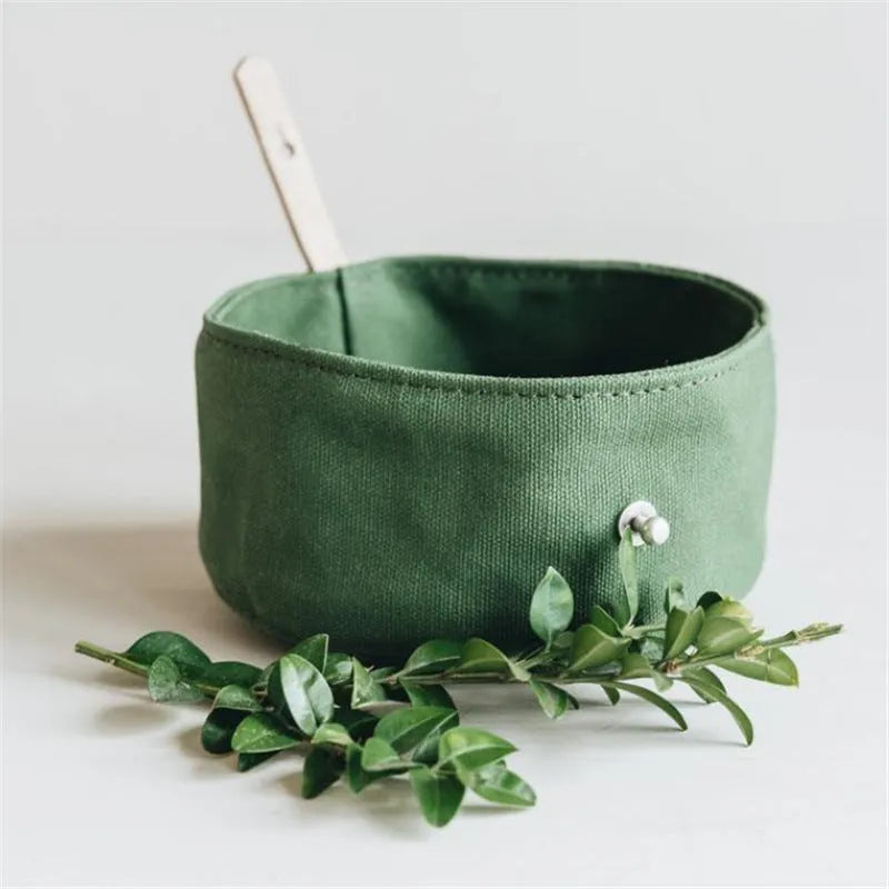 Waterproof foldable travel dog bowl in oil wax canvas round shape 150x75mm green and grey colour options
