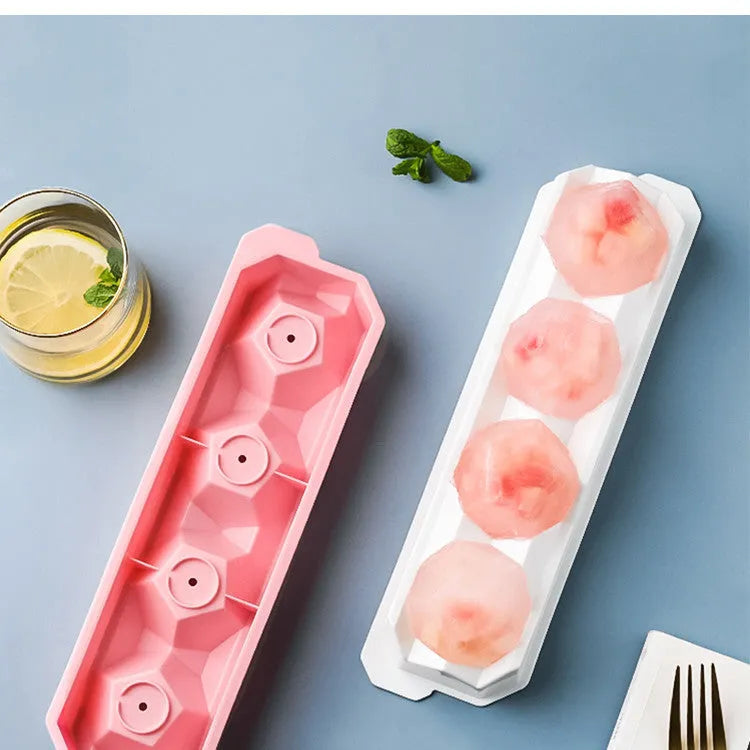 Silicone ice tray for making large ice hockey shapes, pentagons, and spheres in assorted colours