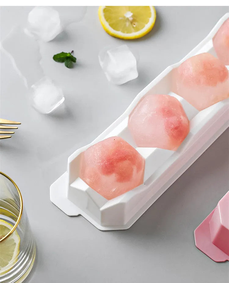 Silicone ice tray for making large ice hockey shapes, pentagons, and spheres in assorted colours