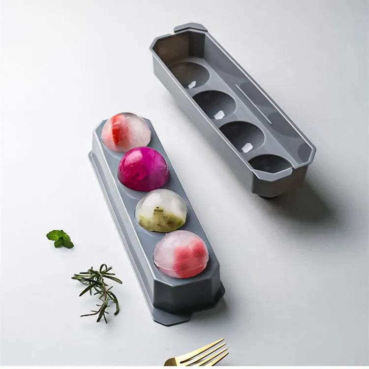 Silicone ice tray for making large ice hockey shapes, pentagons, and spheres in assorted colours