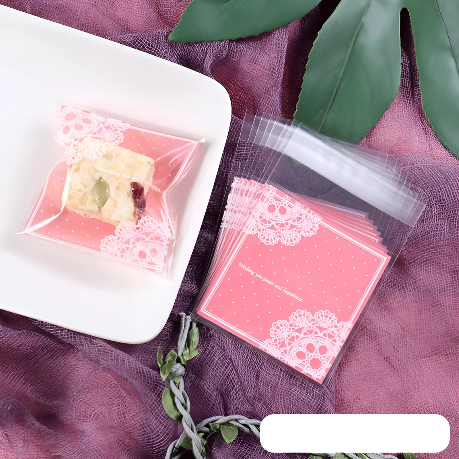 Pink self-adhesive plastic packaging bag for handmade soap and snacks with gusset.