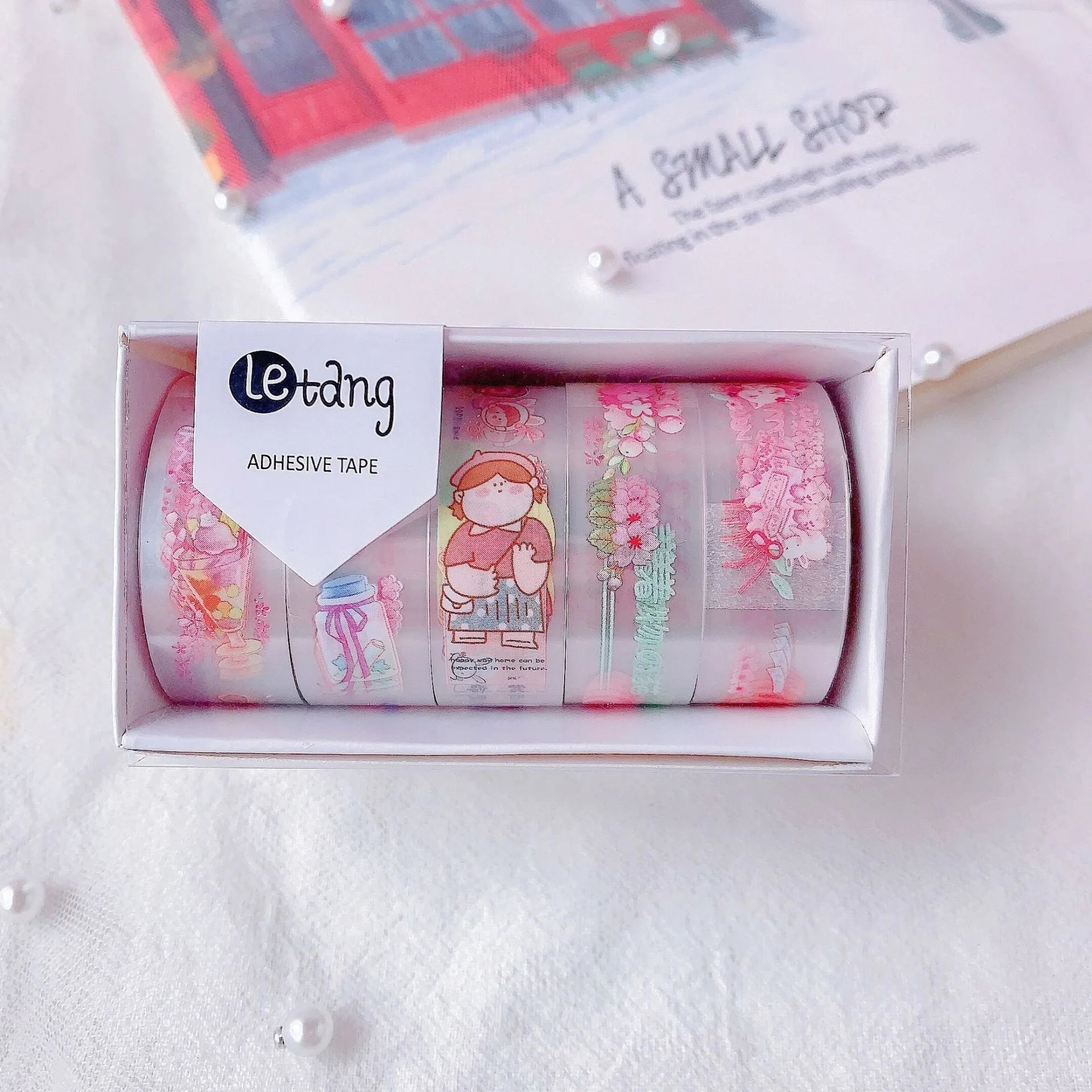Roll of decorative washi tape with cartoon pattern measuring 1.5cm wide