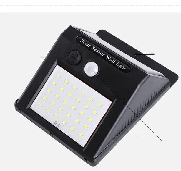 White outdoor solar garden lamp with integrated solar panel on top and LED light array.