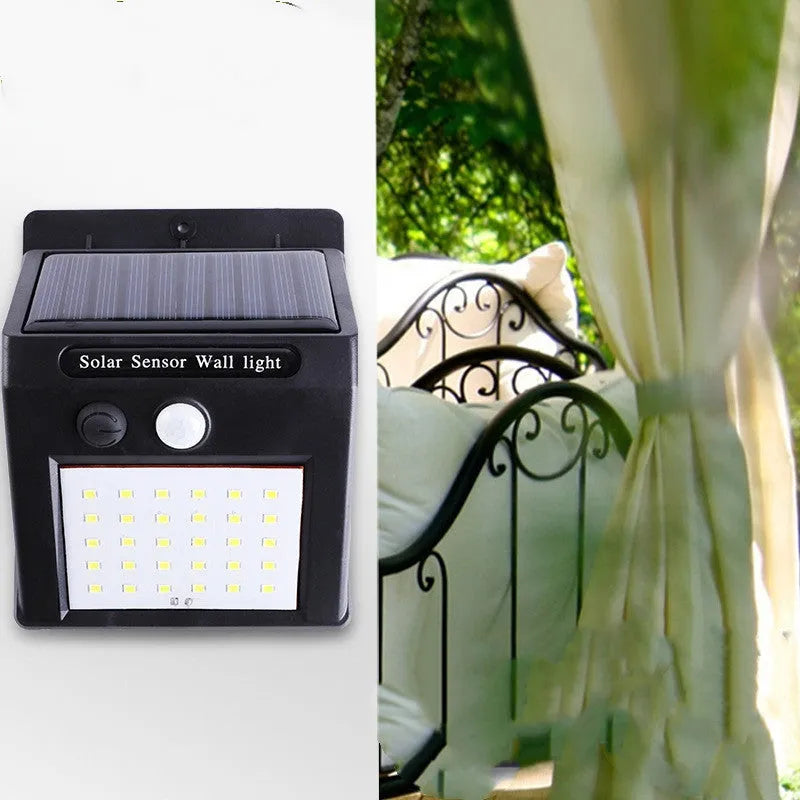 White outdoor solar garden lamp with integrated solar panel on top and LED light array.