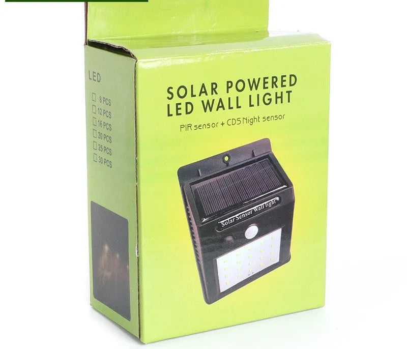 White outdoor solar garden lamp with integrated solar panel on top and LED light array.