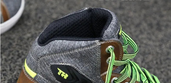 Men's black and grey summer motorcycle casual short boots showing breathable construction and riding shoe design