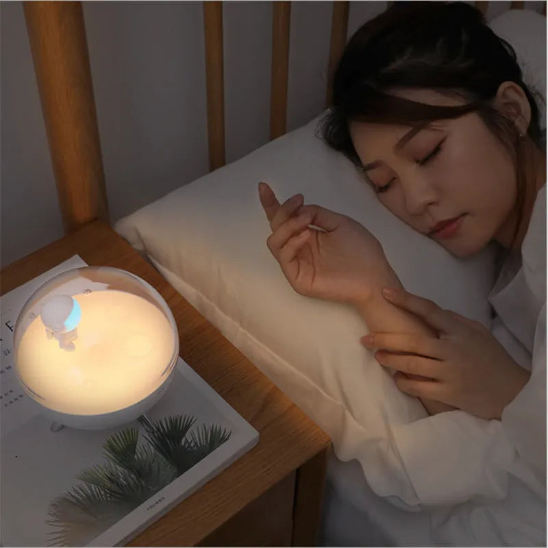 Modern white or blue Guardian USB LED desk lamp with a plastic shade and button switch.