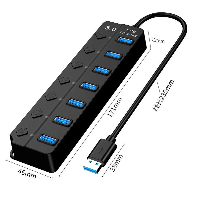 Black 7-port USB 3.0 hub with external power supply on a desktop.