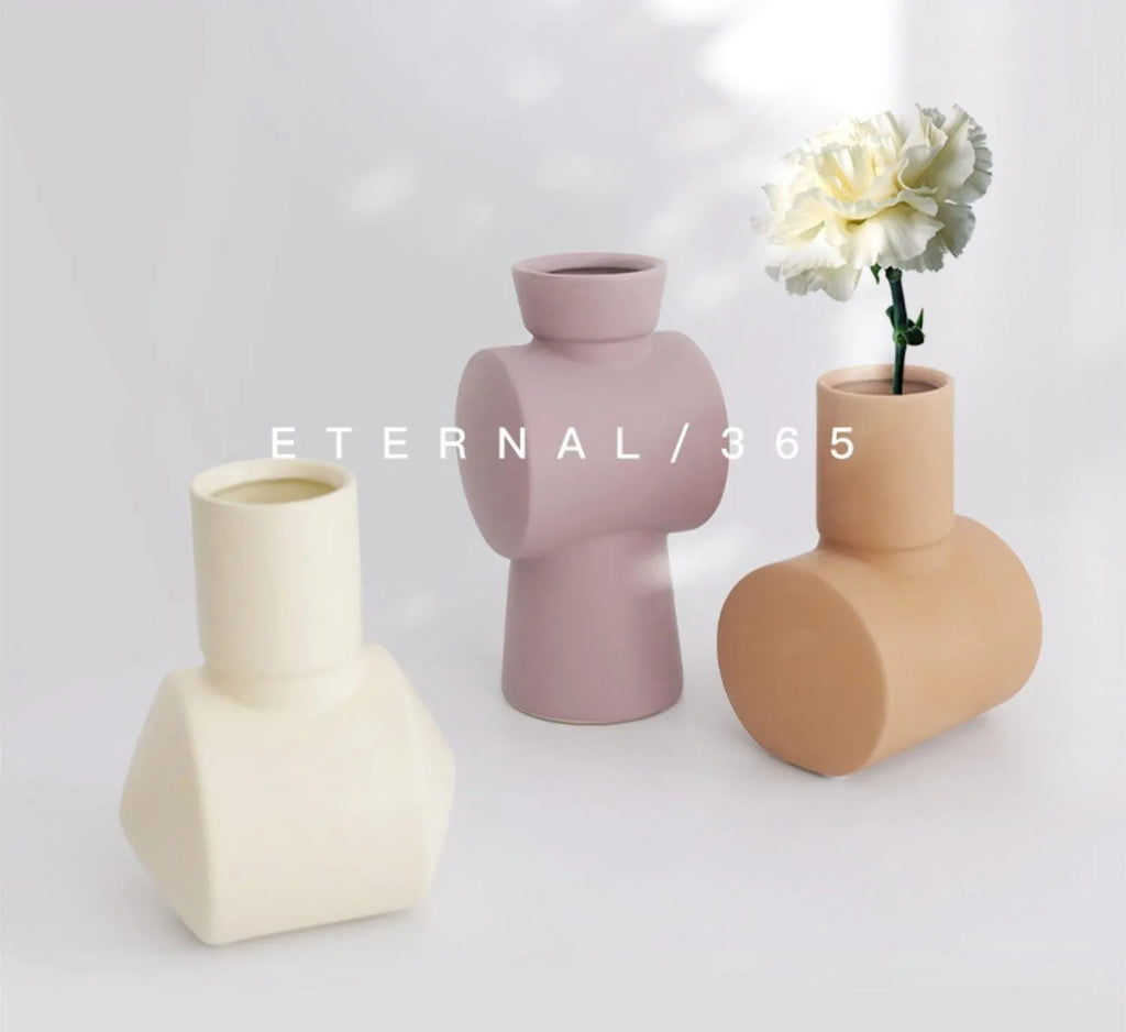 Nordic Morandi style ceramic vase with hammered texture in beige, brown, or purple.