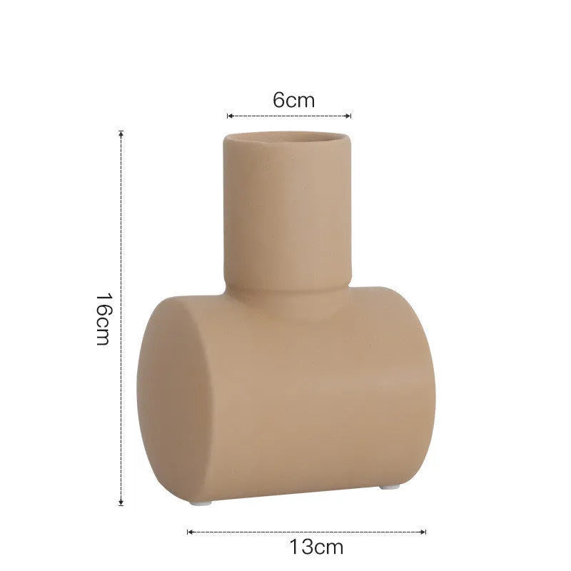 Nordic Morandi style ceramic vase with hammered texture in beige, brown, or purple.