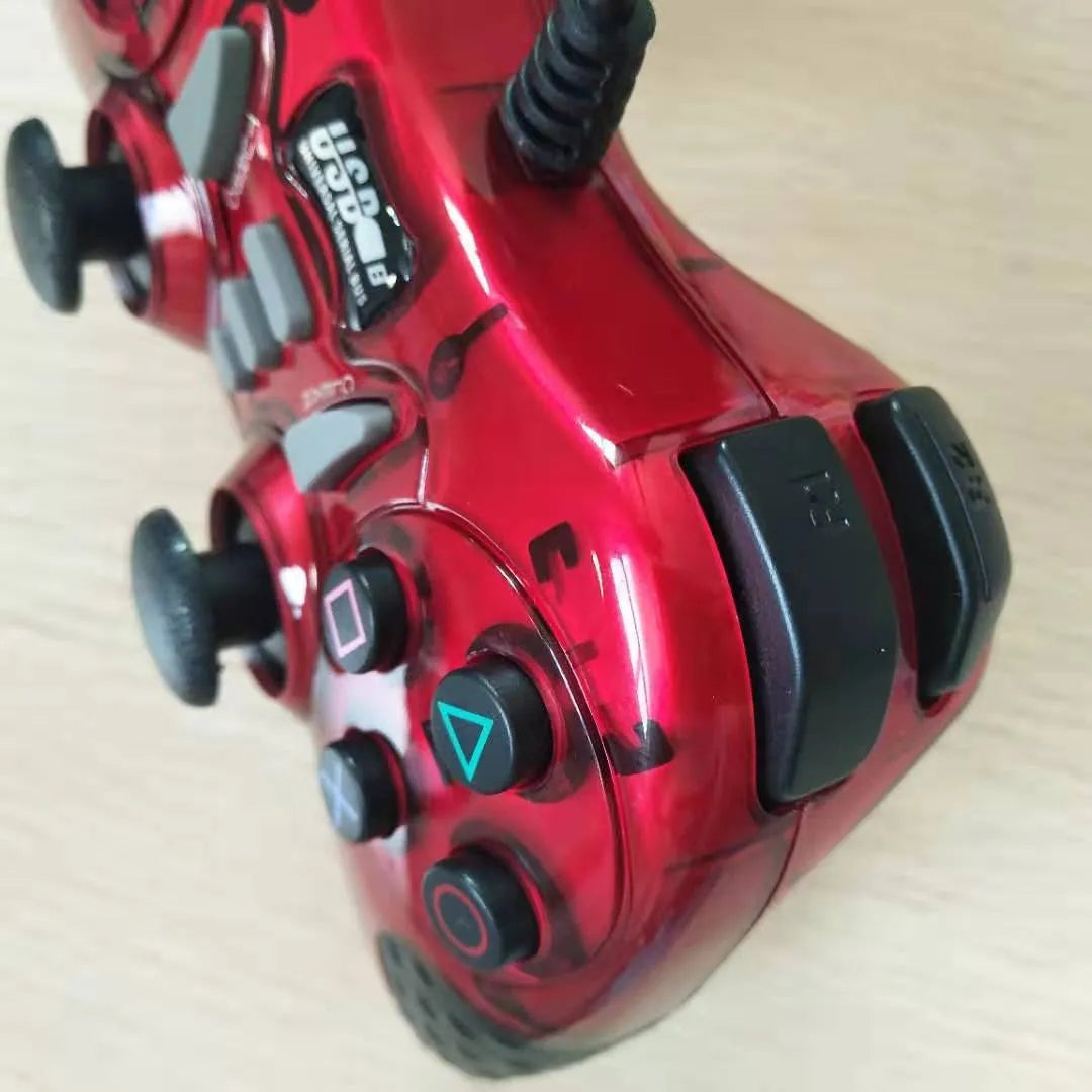 Red ABS plastic multifunctional USB gamepad controller for PC, Android, PS3, and XBOX360.