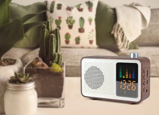 Brown retro Bluetooth radio speaker with wood grain effect and analogue tuning dial