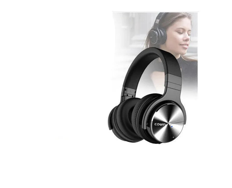 Kayo Cowin E7-Pro foldable ANC Bluetooth headphones in black, showing over-ear design and protein leather ear cups.