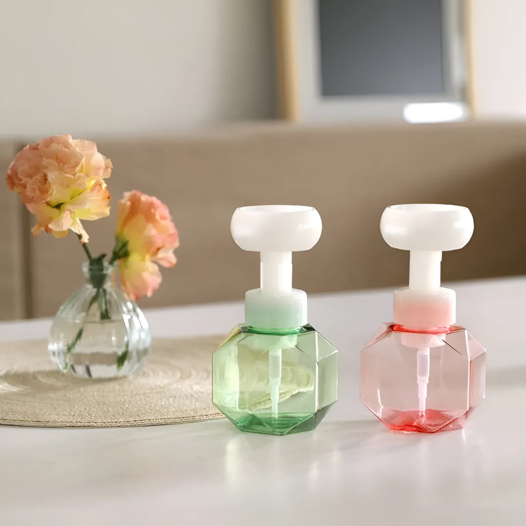 Soft non-woven fabric flower foam bottle for kids in pink, green, blue, and yellow colour options.