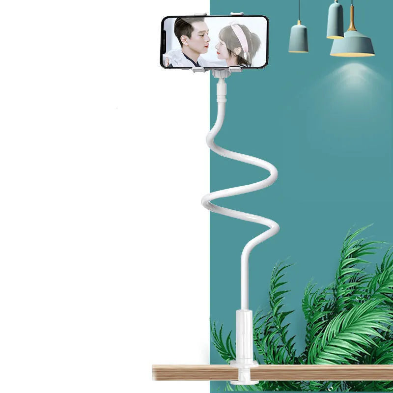 Blue universal mobile phone holder with bendable memory alloy hose on a wooden bedside table.