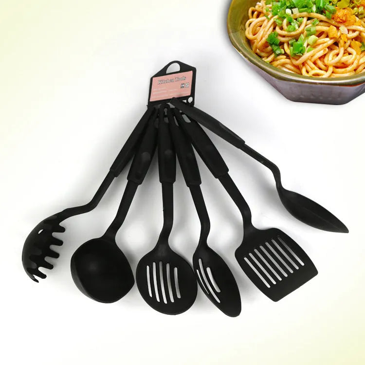 Black rubber shovel spoon kitchen utensil set for non-stick pans.