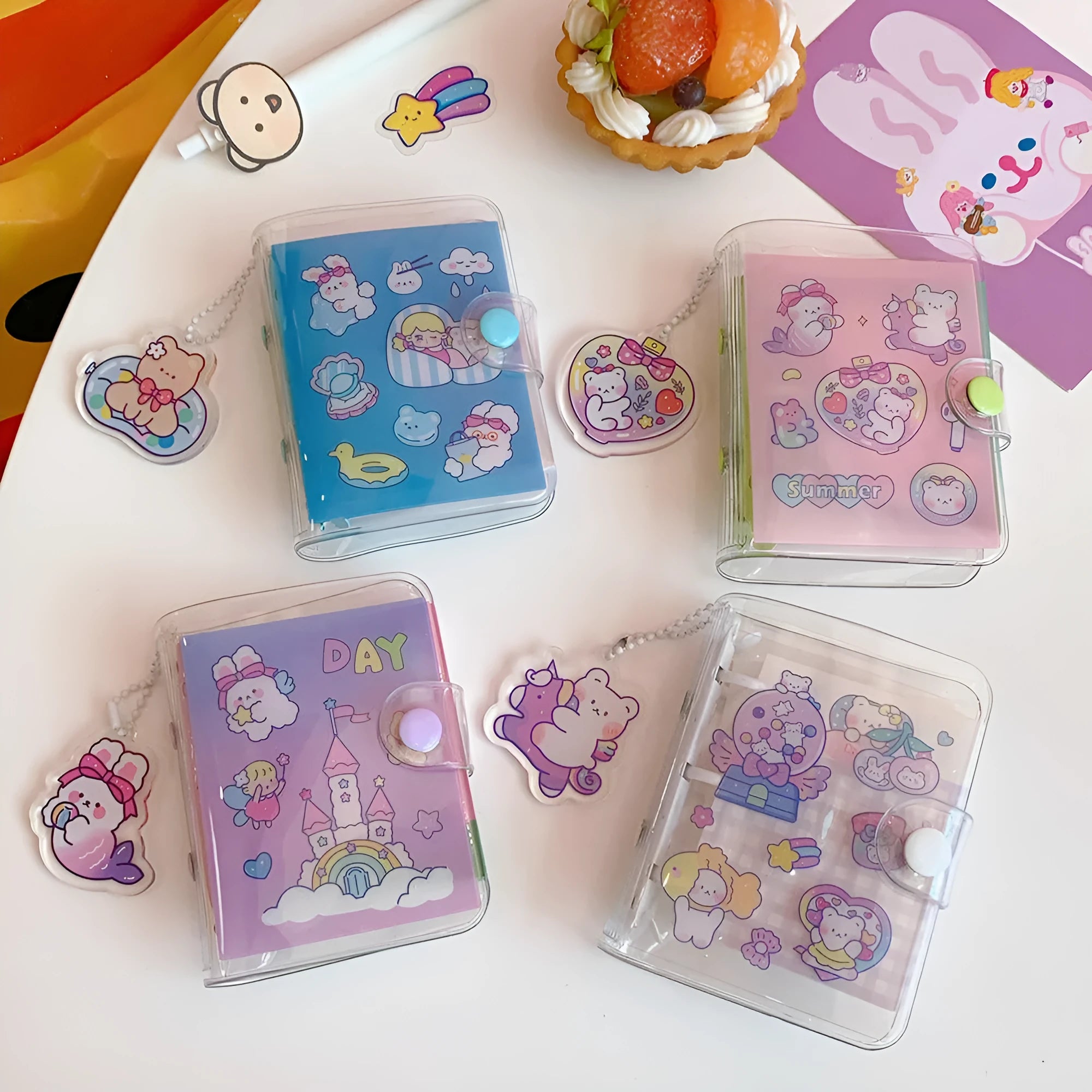 Four colourful loose leaf refill pages showing cute Japanese bear, bunny, and castle designs for notebooks.