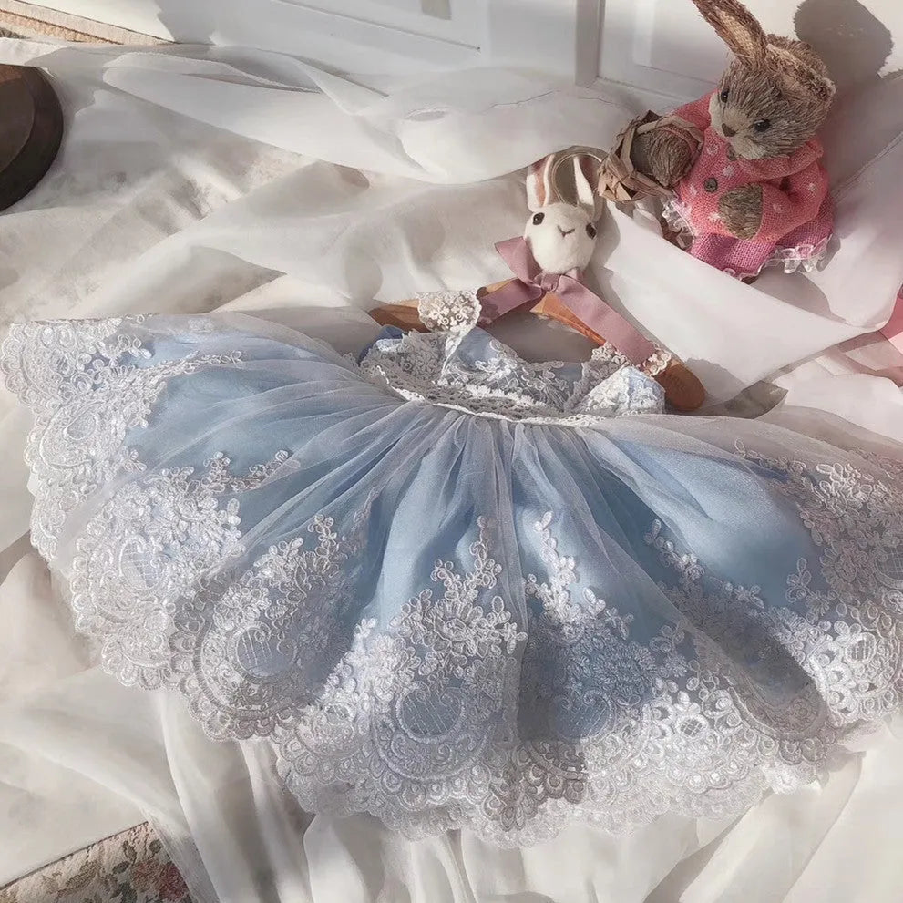 Ocean blue baby girl princess dress with lace details showing front and back views