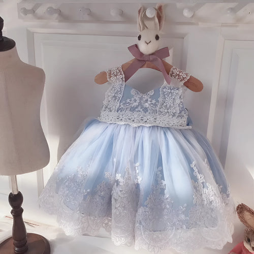 Ocean blue baby girl princess dress with lace details showing front and back views