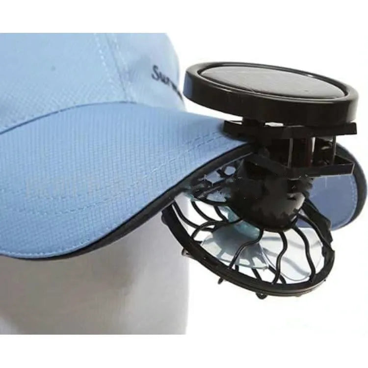 Black clip-on portable solar fan for outdoor cooling during camping and fishing trips.