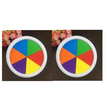 Children's finger print mud kit with plastic inkpad, stamp, and picture album for non-toxic sensory play.