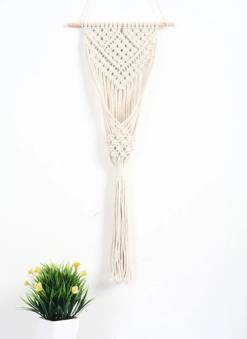 White hand-woven cotton wall tapestry with grid pattern measuring 30cm by 70cm