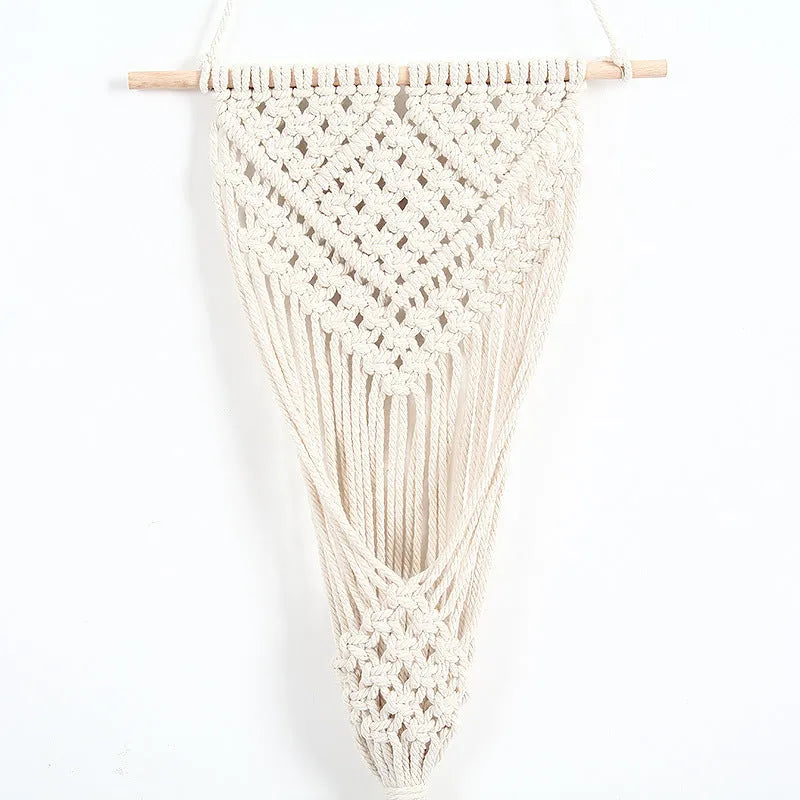White hand-woven cotton wall tapestry with grid pattern measuring 30cm by 70cm