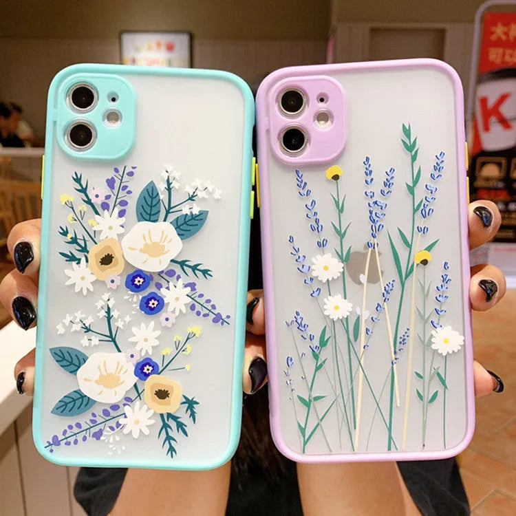Matte TPU iPhone case with floral cartoon design in pink lavender, blue lavender, and blue flower colour options.