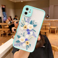 Matte TPU iPhone case with floral cartoon design in pink lavender, blue lavender, and blue flower colour options.