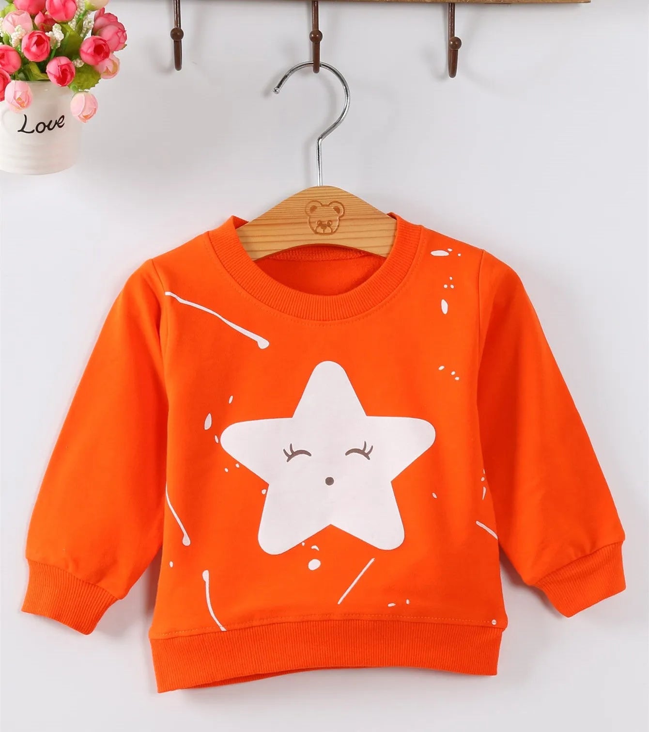 Korean style baby girl's cartoon pattern autumn sweater in soft treated fabric.